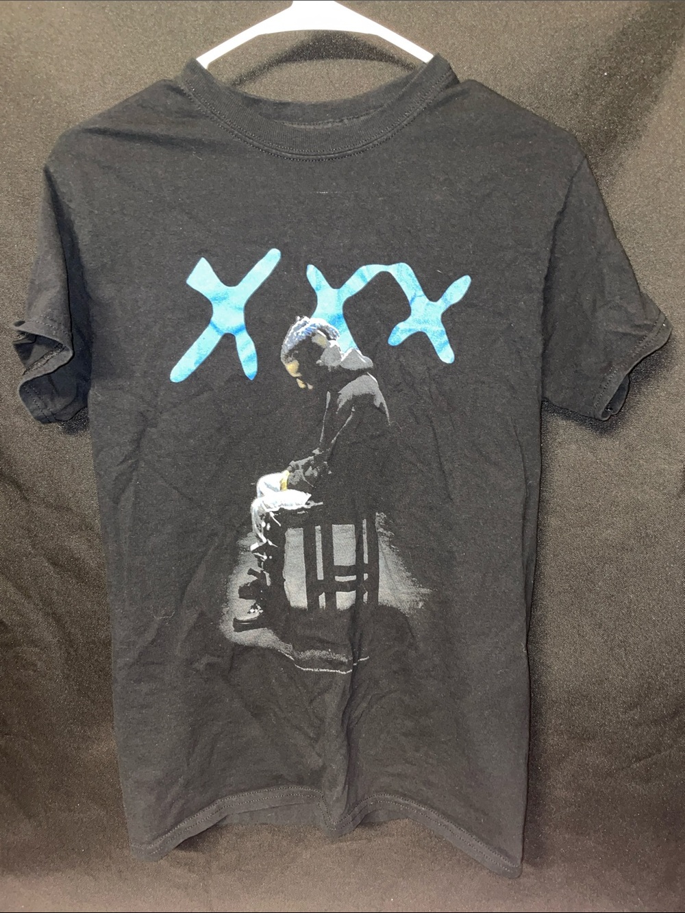 Black Short-Sleeve Graphic Tee with Blue 'XXX' Print - Men's Shirt
